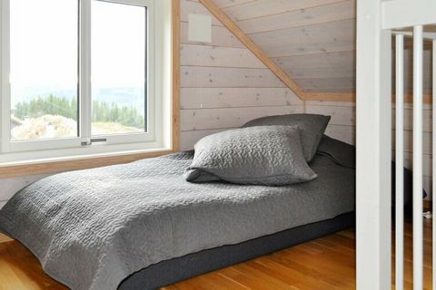 Holiday cabin in Hafjell's central area with a beautiful view towards the river Lågen. The cabin has a brown wooden paint with grass on the roof. The cabin is bright and pleasant, it is divided vertically, with three bedrooms over 2 levels and a loft...