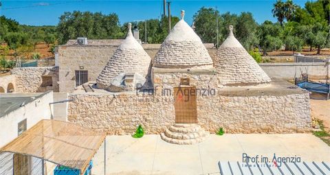 For sale in the countryside of Ceglie Messapica but only one km from the town of San Michele Salentino, a characteristic and charming complex of trulli and lamia with swimming pool. The finely renovated property is composed as follows: there is a thr...