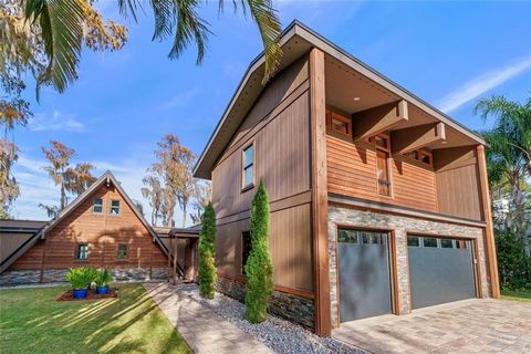 Butler Chain of Lakes Vintage A-Frame - Reimagined! Perhaps one of the most distinctive styles of modern architecture, this is a one-of-a-kind, custom A-Frame home is like no other in the area. This beauty is located on the South shore of Lake Tibet ...