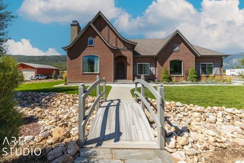 Discover your perfect sanctuary in the breathtaking landscape of Eden, Utah. This spacious, single-level home offers an inviting open-concept floor plan that seamlessly blends comfort and elegance. Enjoy stunning views that will take your breath away...