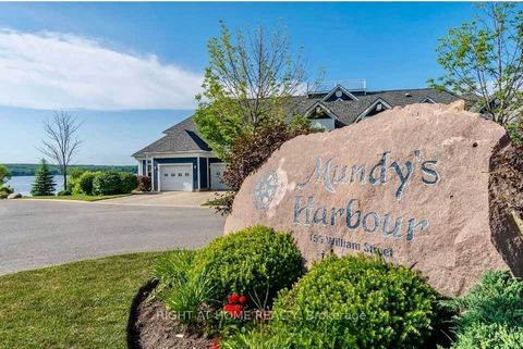 Your Next Chapter Awaits: Discover Waterfront Condo Living Like Never Before! This exclusive enclave of just 18 residences at Mundys Harbour delivers unparalleled waterfront living on Georgian Bay. The meticulously remodelled, three-level Cape Cod-in...