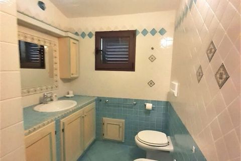 This pleasant apartment on the Italian island of Sardinia has a garden and 2 swimming pools, one of which is ideal for children. The residence is therefore particularly suitable for family holidays. With its nice location near the sea, a day of lazin...