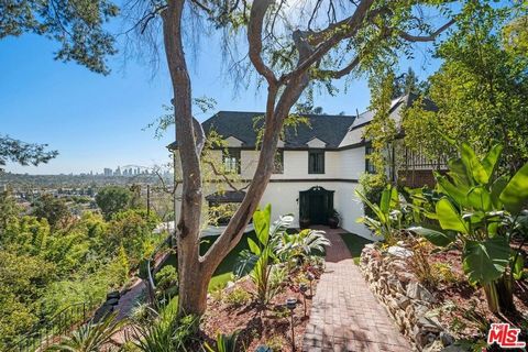 Renovated Hollywood Regency w/ explosive head on DTLA and West Side City lights views. Refurbished period steel windows and opened trussed beam high ceilings enhance scale and volume giving way to a very light-n-bright move-in-ready transitional inte...