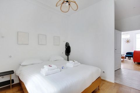The flat is brand new, tastefully decorated and located on the ground floor of a typical Parisian building. - A living room with a sofa - A bedroom with a double bed and storage space - A separate and equipped kitchen (fridge, induction cooker, micro...