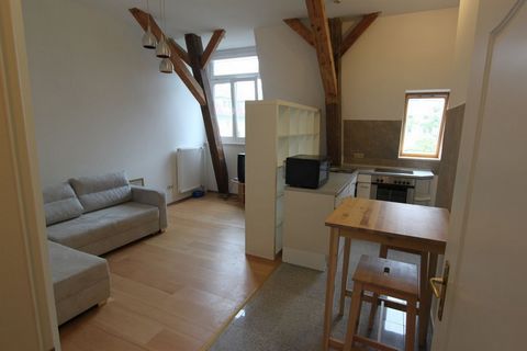 This attractive property is a renovated attic apartment on the first floor. In the apartment you have two nice rooms at your disposal for free development. In addition to a parking space, a fitted kitchen belongs to the apartment, which saves you tim...