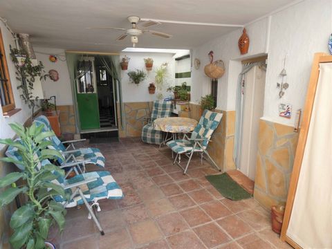 Centrally located 2 bedroom village house including separate guest accommodation. Central patio, storeroom and small roof terrace. Walking distance to all the village amenities.