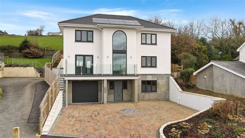Introducing this exquisite 4-bedroom, brand new, detached house nestled in the charming village of Bishops Tawton. Exuding a modern and luxurious ambience, this property is a true testament to refined living. Upon entering, you'll be greeted by a bri...