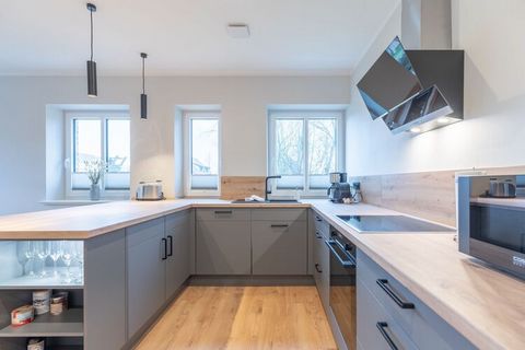 This newly built holiday home can accommodate up to five people. The semi-detached house is modern and exclusively furnished and offers everything you need for your stay. The spacious living area invites you to cozy TV hours with a beautiful sofa are...