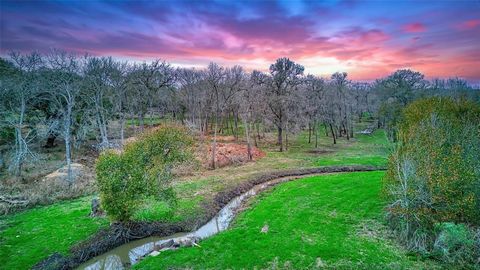 Stunning 40+ acre property boasting a diverse landscape of hardwood trees, this multi-use gem holds immense potential for both commercial and future residential development. Bells Creek gracefully lines the right border of the property. Annexed w/cit...