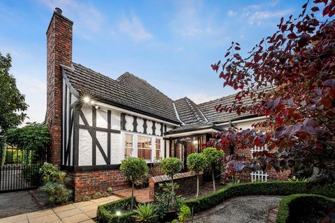 Positioned well back from the street behind a manicured garden, this captivating c1930’s English style solid brick residence is the very definition of family appeal with its generosity of space, versatile floor plan and stunning blend of period elega...