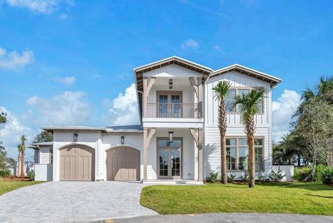 Escape to luxury coastal living in this exceptional new construction house, situated in the sought-after non-rental gated neighborhood of Sand Cliffs. This meticulously crafted home offers exclusive deeded beach access in a serene setting that evokes...