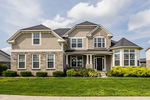 A beautiful balance of sophistication and comfort, this timeless Brookhaven home offers refined living in one of Zionsville's most desirable neighborhoods. From the moment the grand two-story foyer opens, the home unfolds with intention. Wide-plank h...