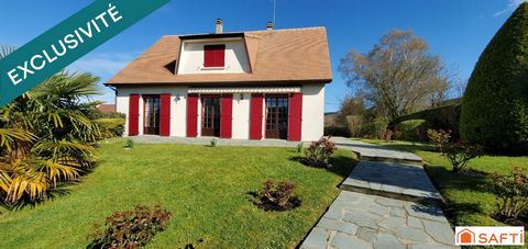 Maison familiale de 5 pièces de 130 m2 avec un joli jardin arboré et un sous-sol complet