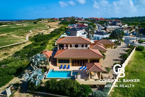 This amazing Hacienda style estate is located in Tierra Del Sol, Aruba's prestigious gated Golf community. It offers a landscaped tile courtyard and is styled with 6 bedrooms and 6,5 bathrooms. This spectacular Villa includes an indoor waterfall wall...