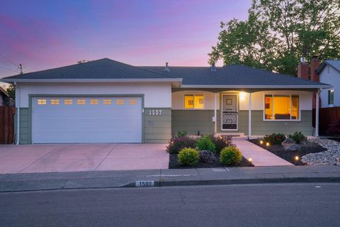Welcome to this charming single-level home that boasts 3 bedrooms, 2 bathrooms, and has undergone numerous updates, offering a modern and comfortable living space. Upon entering, you'll be greeted by an inviting living room that features a large wind...