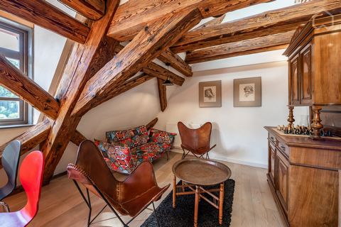 Living at Mühlen Castle The apartment on 2 levels includes an eat-in kitchen with living room and dining table, a shower room and on the gallery level above it the bedroom with a double bed. The apartment is oriented to the south and north. Kitchen w...