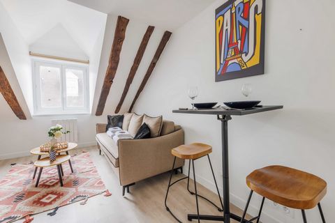 Welcome to this enchanting Parisian studio, a hidden gem on the 5th floor, offering 14m² of cozy living space and boasting an incredible view of the iconic Eiffel Tower. As you step into this delightful abode, you'll be captivated by the picturesque ...