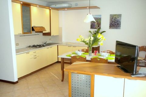 This beautiful holiday home with 2 cozy bedrooms and a shared swimming pool rests in Lazise, a charming town directly on Lake Garda. You can spend an awesome holiday here with a family or group having 5 members. In the evenings, you can walk to the t...