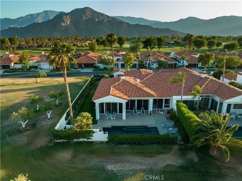Presenting a stunning desert retreat located in the prestigious Citrus Club of La Quinta. This magnificent residence is positioned on a spacious corner lot, providing both ample space and a sense of privacy. As you step inside, you'll be greeted by v...