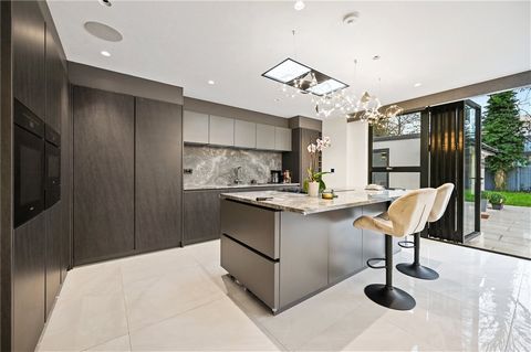 Discover luxury living in this newly built six-bedroom home on one of Harrow's premier streets. Boasting over 4700 sq. ft of opulent space, the residence features a full home automation system, underfloor heating, and a sleek 33' living/dining and ki...