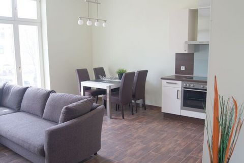 The holiday apartment offers you a harmonious living and dining room with a sofa bed, TV and mini system (including DVD & Bluetooth), an inviting dining area and an extravagant fitted kitchen (stove, ceramic hob, microwave, dishwasher) (coin-operated...