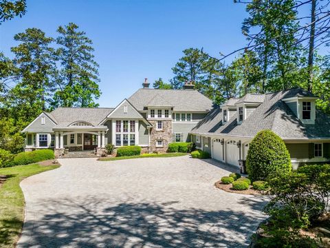 DON'T MISS THIS ONE OF A KIND LAKE HOME IN REYNOLDS LAKE OCONEE. DESIGNED BY RENOWN ARCHITECT DON BECK AND CONSTRUCTED BY WILLIAM TAYLOR CUSTOM HOMES, NO DETAIL INSIDE OR OUT OF THIS BEAUTIFUL HOME WAS OVERLOOKED AND NO COST WAS SPARED. IT IS SIMPLY ...