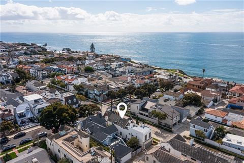Discover the untapped potential of this rare 30' corner lot in the coveted Village of Corona del Mar. Enjoy sweeping views from both its rooftop deck and generous front patio with vistas that stretch from the serene ocean to the dynamic coastline and...