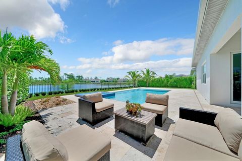 Welcome to this stunning home in the sought after gated community of Banyan Bay! Situated on one of the best lots in the neighborhood, this home offers breathtaking views of both the lake and preserves, creating a serene backdrop for daily living. St...