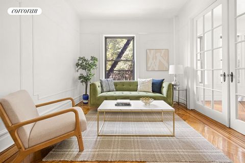 Bright and quiet, this renovated two-bedroom coop is only one flight up and one block from Prospect Park and from the F/G train. The sun-filled living room offers ample space to entertain while large French doors lead to the main bedroom. A lovely wi...