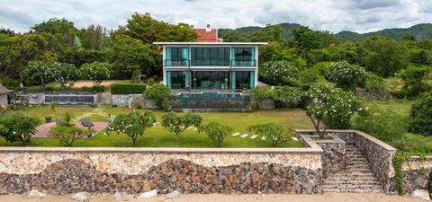 Situated just a 15-minute drive south of Hua Hin in Khao Tao, this modern villa offers stunning views of two well-known islands. The villa features an open-plan living, dining, and kitchen area. All four bedrooms face the sea, with two on the ground ...