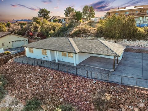 This stunning, newly built property is perched atop a scenic hill, offering breathtaking mountain views. Outside, the design seamlessly integrates with the natural landscape. Inside, the great-room concept layout is highlighted by sleek finishes and ...