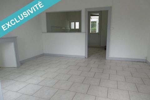 Jolie maison avec un terrain attenant.