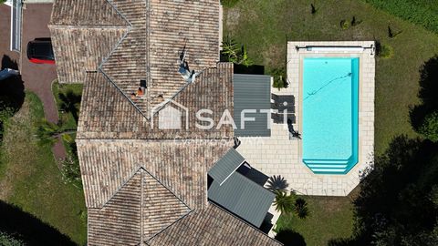 Superbe maison plain-pied baignée de lumière avec double garage et piscine