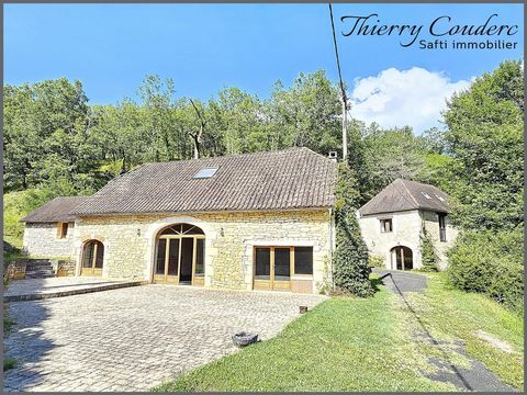 Maison en pierre avec gîte et piscine.