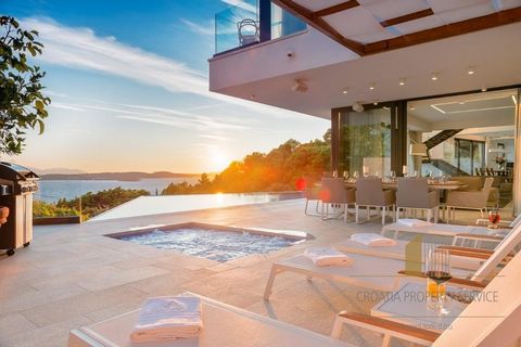 Exclusive location with an incredible panoramic view of the Pakleni otok and the town of Hvar! The modern villa is located 400 m from Amofora beach and the crystal clear sea. The island of Hvar is one of the most popular summer destinations in Europe...