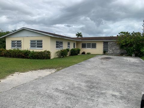 This very large, well landscaped ideally located property on a corner lot, has much to offer. Well priced 5 bedroom/4 bath, living, dining, kitchen, florida room, utility room. Grounds enclosed with fencing and shed foundation, front & rear driveways...
