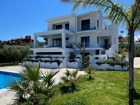 This luxurious villa spreads over three levels covering a total area of 370 sq. m. The shades of white play with the ample natural light that enters the living room through the big glass doors during the day, creating a warm but at the same time impo...
