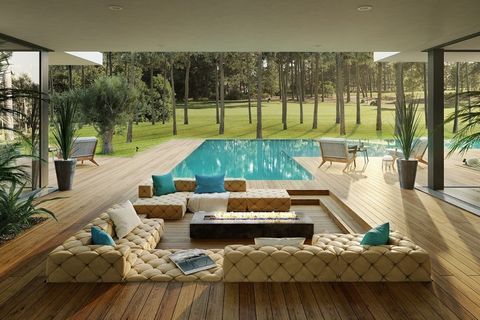 Step into a world of luxury and exclusivity with this magnificent contemporary villa located on the 1st line of the prestigious Herdade da Aroeira golf-condominium. Only 5 minutes away from the beach and 20 minutes from Lisbon, this villa boasts a pr...