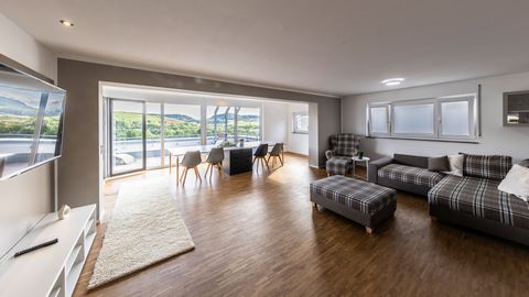 Our spacious 135 sqm penthouse-style apartment in Erlenbach offers everything you need for an unforgettable stay. The highlight is the great roof terrace, which offers a terrific view into the vastness of the surrounding landscape - the perfect place...