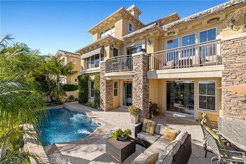 Welcome to 34 Sunset Cove in Newport Coast-an exquisite 5-bedroom, 4-bathroom sanctuary nestled within the prestigious gated community of Pelican Ridge Civita. This home boasts breathtaking panoramic ocean views and indulges in luxury with its sparkl...