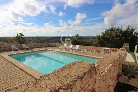 PUGLIA . ITRIA VALLEY. CISTERNINO MASSERIA WITH TRULLI AND POOL. VIEWS Coldwell Banker offers for sale, exclusively, a farmhouse with trulli and a magnificent swimming pool in the heart of the Itria Valley in Puglia. In this elegant historic residenc...