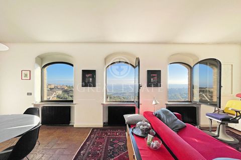 This wonderful apartment in the historical centre of Montalcino is developed on several levels as follows. The entrance with hallway is on the ground floor, from here via an internal staircase it is possible to reach the basement where there is a cel...