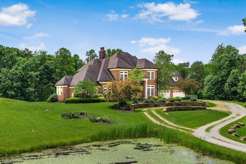 This is an extraordinary opportunity to own this stately brick estate sitting on 33 + acres surrounded by all the beauty of the Hocking Hills and flanked by state forest. This magnificent home boasts over 10,000 square feet of finished living space o...