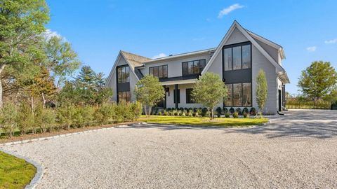 Brand-new custom Hamptons home built in 2024 on 1.03 acres in Water Mill. This transitional style residence, styled by Greg McKenzie Design, features 7 bedrooms, 8 full baths and 2 half baths. Classic, traditional elements blend with modern touches o...