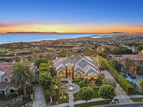 This legacy estate in the esteemed enclave of Pelican Crest brims with European style, every space curated with art-quality installations and finishes capturing panoramic views to match their incomparable setting that stretch from the Pelican Hills G...