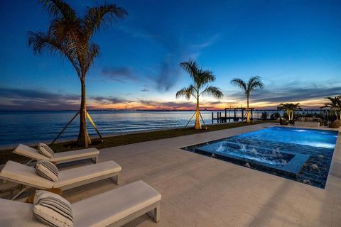 Pure Magnificence awaits in this Ultra-Luxury Modern Coastal gated estate in the coveted community of Davis Islands boasting waterfront grandeur, spectacular views, and captivating sunsets year-round. Positioned on one of the largest Bayfront parcels...