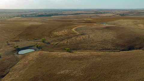 Property Location: Located in Lincoln County at the intersection of E Milo Drive and North 20th Road, just a 1 mile north of Highway 18 and 3 miles east of Lucas, KS. Legal Description: S32, T11, R10, ACRES 637.5, ALL OF SEC LESS RD R/WThis expansive...