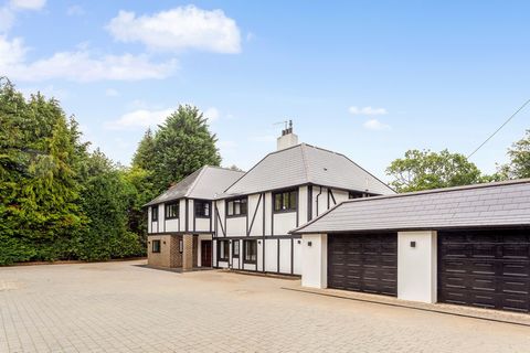 Approached through a double gated and spacious driveway, Brownstacks offers approximately 7300 sq ft across two floors, set within generous grounds of 0.7 of an acre. The property is entered by a generous hallway with an architect designed feature ce...
