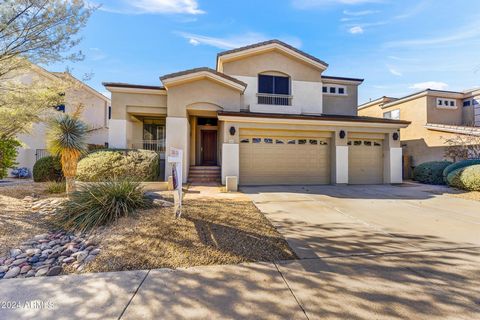This is it! Beautiful 4 bedroom, 3 bath, 3 car garage with heated pool/spa located in Desert Ridge. Newly painted exterior, remodeled gourmet kitchen with granite countertops and new cabinets, updated bathrooms. Primary bedroom opens to large balcony...