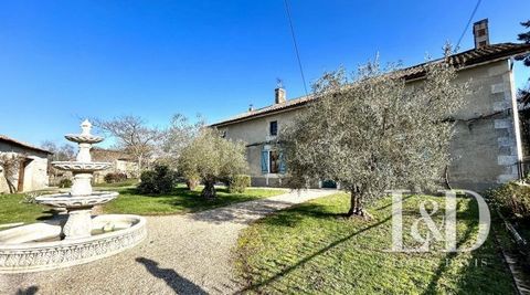 The Lloyd And Davis agency presents for sale this beautiful farmhouse completely renovated and its outbuildings surrounded by its 5448m² enclosed and wooded land. This real estate complex includes: - An old restored farmhouse, of 254m2 comprising: On...